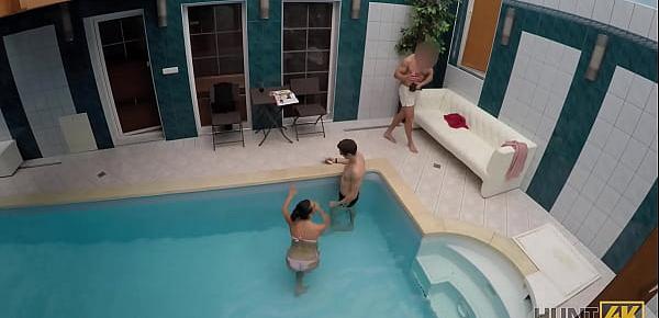  HUNT4K. Slim brunette has sex with stranger by the pool near her man